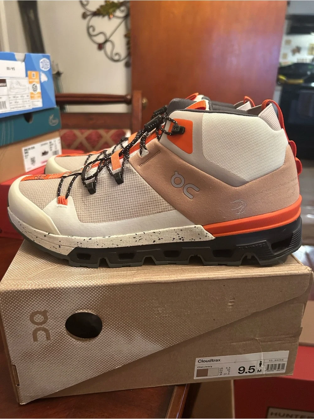 Men’s On Cloudtrax Shoes in Chalk/Ivory with Orange Accents